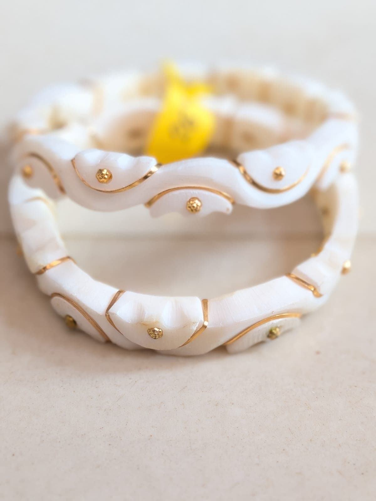 Hand-Carved Shankha Bangles with Red Accents - 1